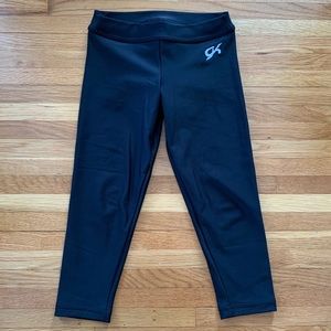 NWOT GK Elite black lined crops size adult XS